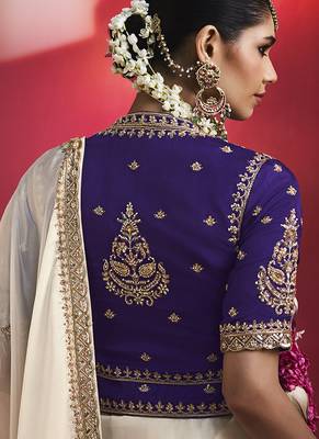 white silk blend saree with purple embroidered blouse & zari border 4