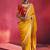mustard yellow silk blend saree with red embroidered blouse & zari border