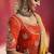 mustard yellow silk blend saree with red embroidered blouse & zari border