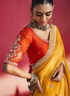 mustard yellow silk blend saree with red embroidered blouse & zari border 4
