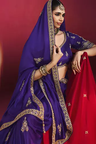 purple silk blend saree with gold embroidered border & designer blouse