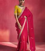 rani pink silk blend saree with mustard yellow embroidered blouse & zari border