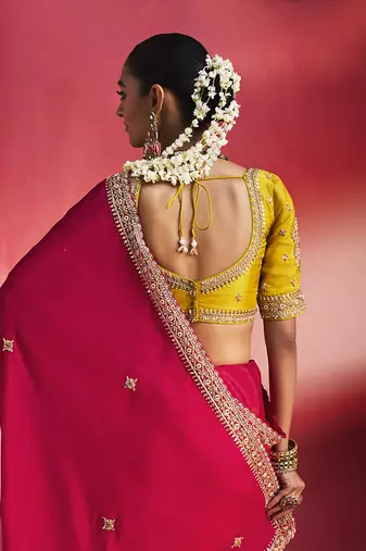 rani pink silk blend saree with mustard yellow embroidered blouse & zari border