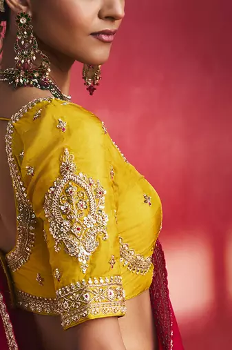 rani pink silk blend saree with mustard yellow embroidered blouse & zari border