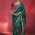 bottle green silk blend saree with rani pink embroidered blouse & zari border