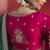 bottle green silk blend saree with rani pink embroidered blouse & zari border