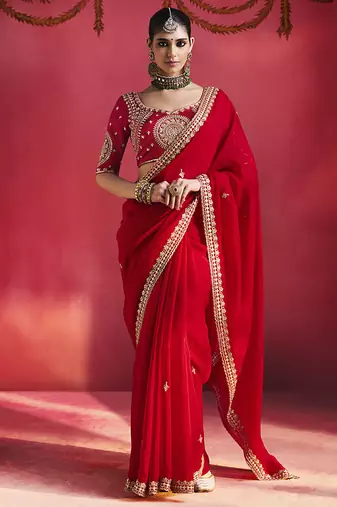 red silk blend saree with gold embroidered border & designer blouse