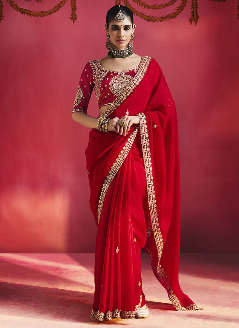 red silk blend saree with gold embroidered border & designer blouse
