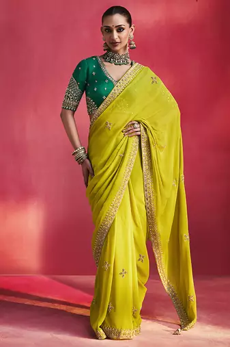 lime green silk blend saree with bottle green embroidered blouse & zari border