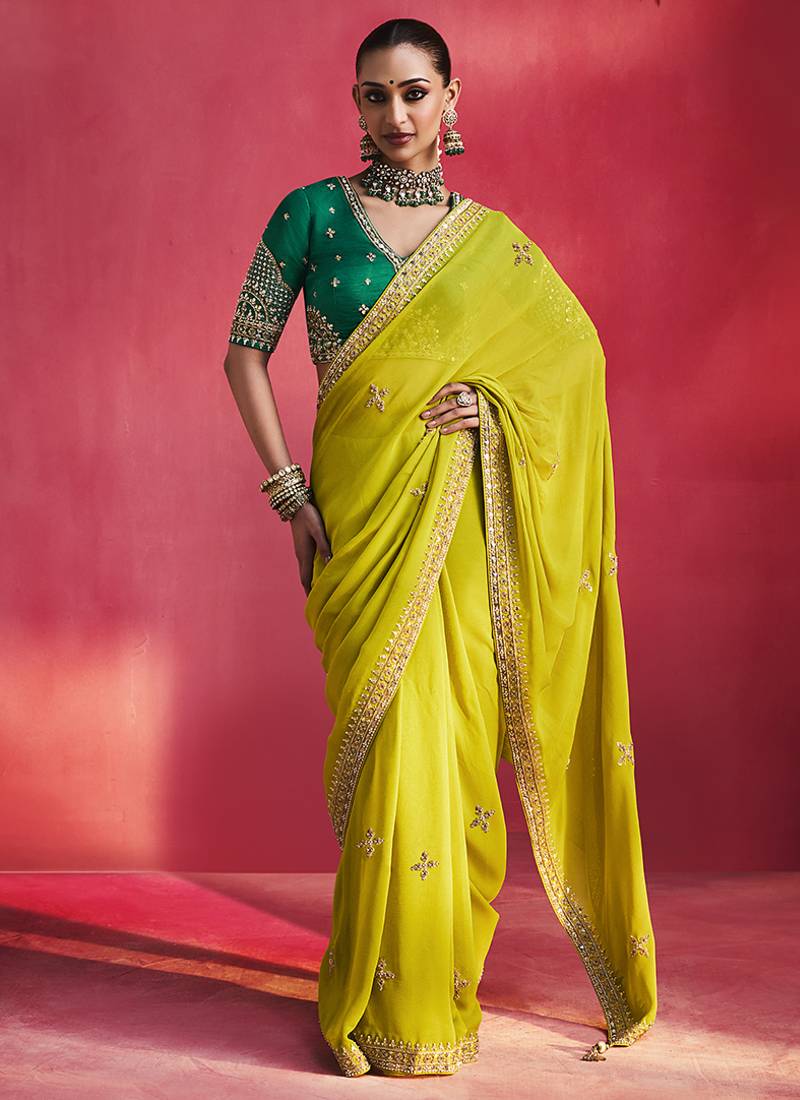lime green silk blend saree with bottle green embroidered blouse & zari border