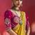 mustard yellow silk blend saree with rani pink embroidered blouse & zari border