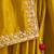 mustard yellow silk blend saree with rani pink embroidered blouse & zari border