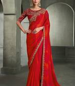 red and orange shaded faux chiffon saree with zari embroidered blouse