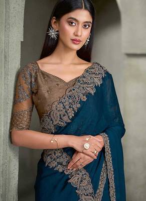 teal blue faux georgette saree with antique gold embroidered border 2