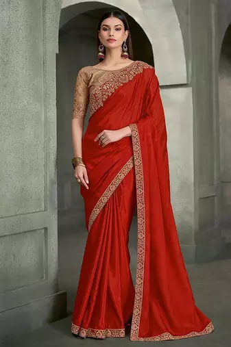 crimson red faux crepe saree with embroidered pallu and border