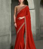 crimson red faux crepe saree with embroidered pallu and border