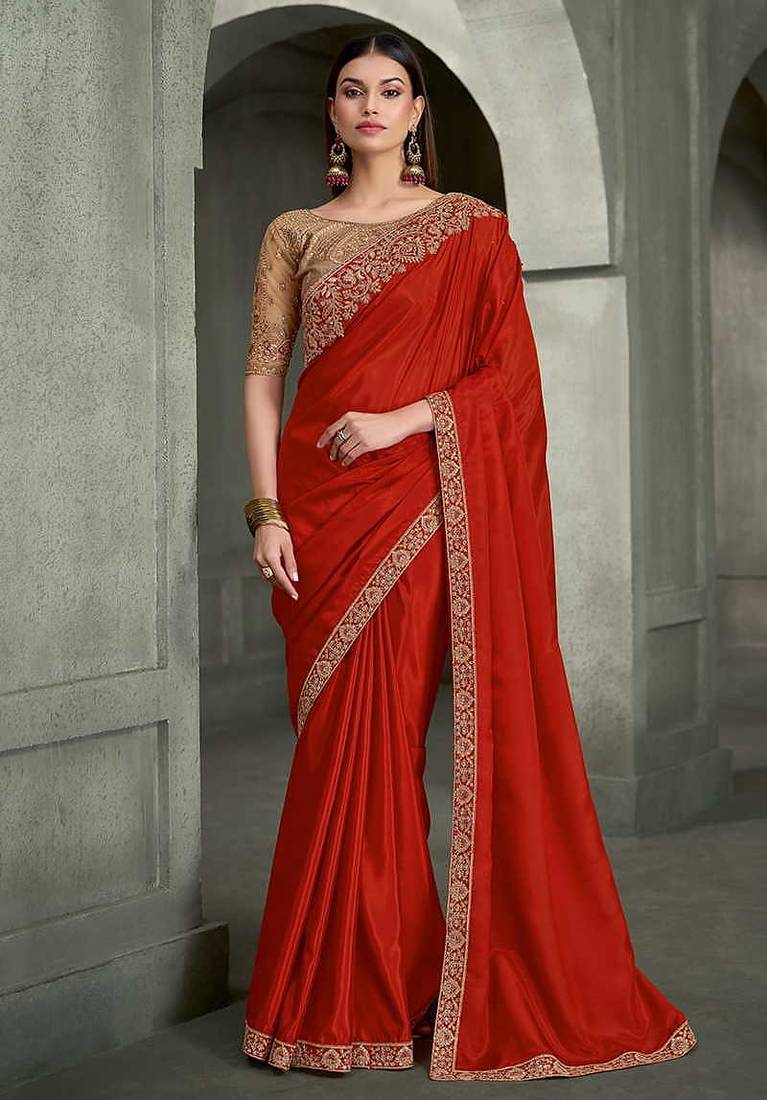 crimson red faux crepe saree with embroidered pallu and border