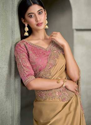 beige gold faux georgette saree with onion pink embroidered blouse 2