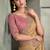 beige gold faux georgette saree with onion pink embroidered blouse
