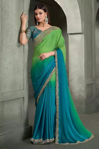 lime green and teal blue faux chiffon saree with teal embroidered blouse
