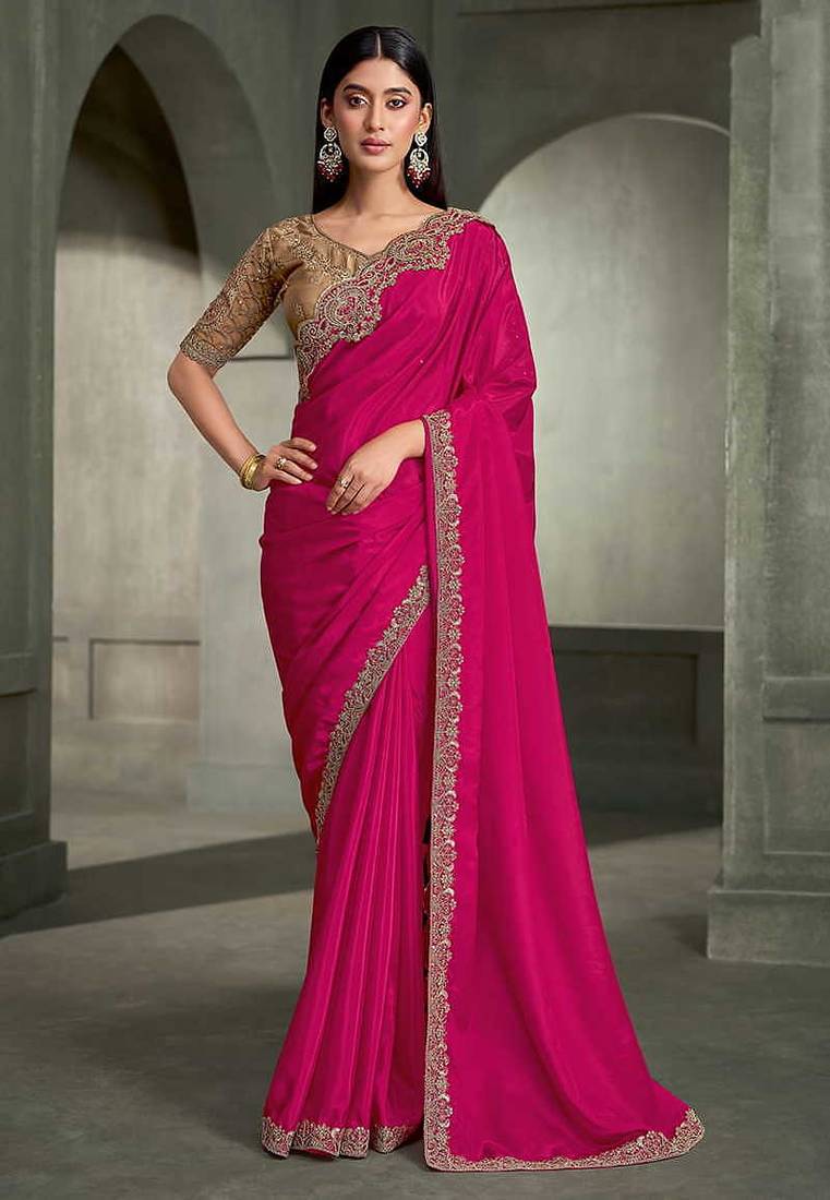 rani pink faux crepe saree with embroidered border and blouse