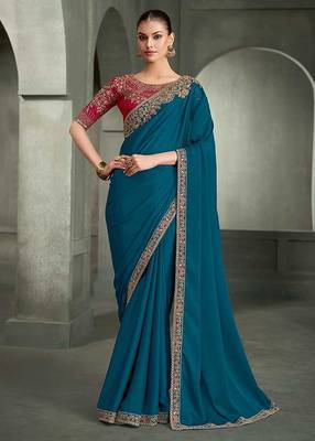 teal blue faux crepe saree with crimson red embroidered blouse 1