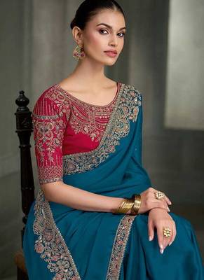 teal blue faux crepe saree with crimson red embroidered blouse 2