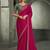 rani pink faux chiffon saree with green embroidered blouse