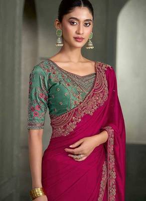 rani pink faux chiffon saree with green embroidered blouse 2