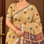 beige floral muga cotton blend jamdani saree with blouse