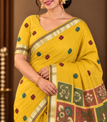 yellow floral muga cotton blend jamdani saree with blouse
