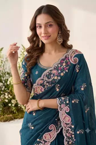 Teal blue silk blend saree with contrast thread embroidery & designer scallop cutwork border with heavy blouse