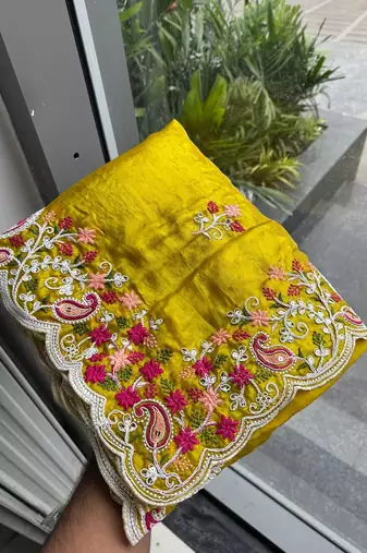 Yellow silk blend saree with contrast thread embroidery & designer scallop cutwork border with heavy blouse