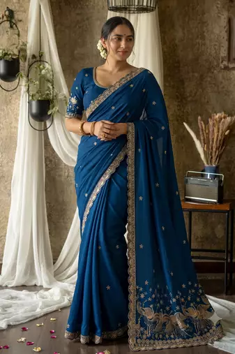 Women's teal blue embroidered saree with blouse piece