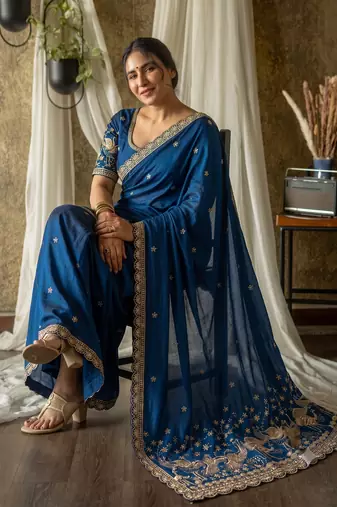 Women's teal blue embroidered saree with blouse piece