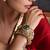 Gold plated emerald green polki cuff bangle