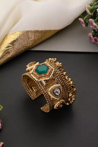 Gold plated emerald green polki cuff bangle
