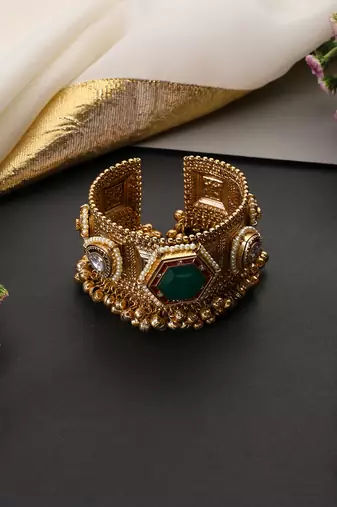 Gold plated emerald green polki cuff bangle