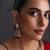 Gold plated ruby red polki jhumka earrings