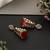 Gold plated ruby red polki jhumka earrings