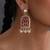 Gold plated red polki dangler earrings