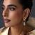 Gold plated green polki dangler earrings