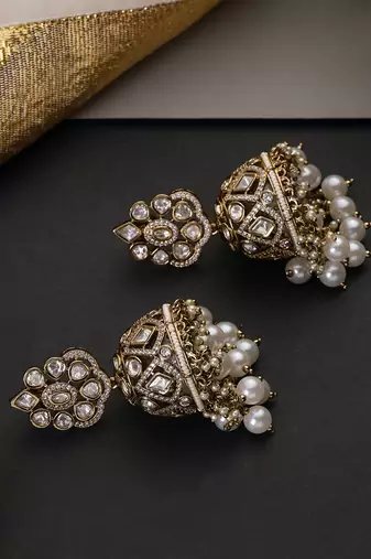 Gold plated white beaded polki jhumka earrings