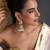 Gold plated white beaded polki jhumka earrings