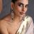 Gold plated emerald green polki jhumka earrings