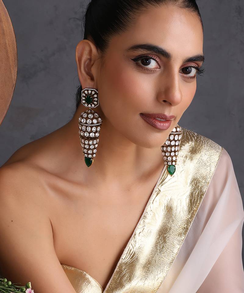 Gold plated emerald green polki jhumka earrings