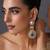 Gold plated emerald green polki dangler earrings