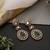 Gold plated emerald green polki dangler earrings