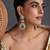 Gold plated emerald green polki dangler earrings