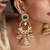 Gold plated emerald green polki kundan jhumka earrings